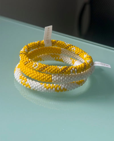 Pulsera nepalí bicolor blanco amarillo