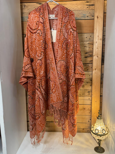 Poncho lana bordado naranja Poc a Poc