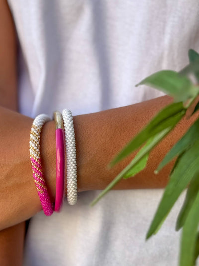 Pulsera nepalí fucsia-blanco-oro