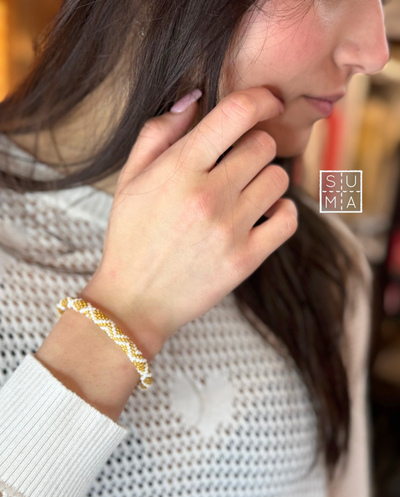 Pulsera nepalí zig zag blanco y dorado D04