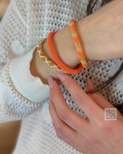 Pulsera nepalí  coral y dorado A20