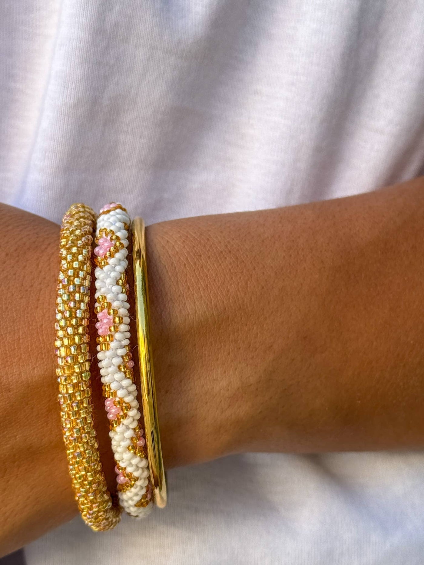 Pulsera nepalí blanco-rombos rosa oro