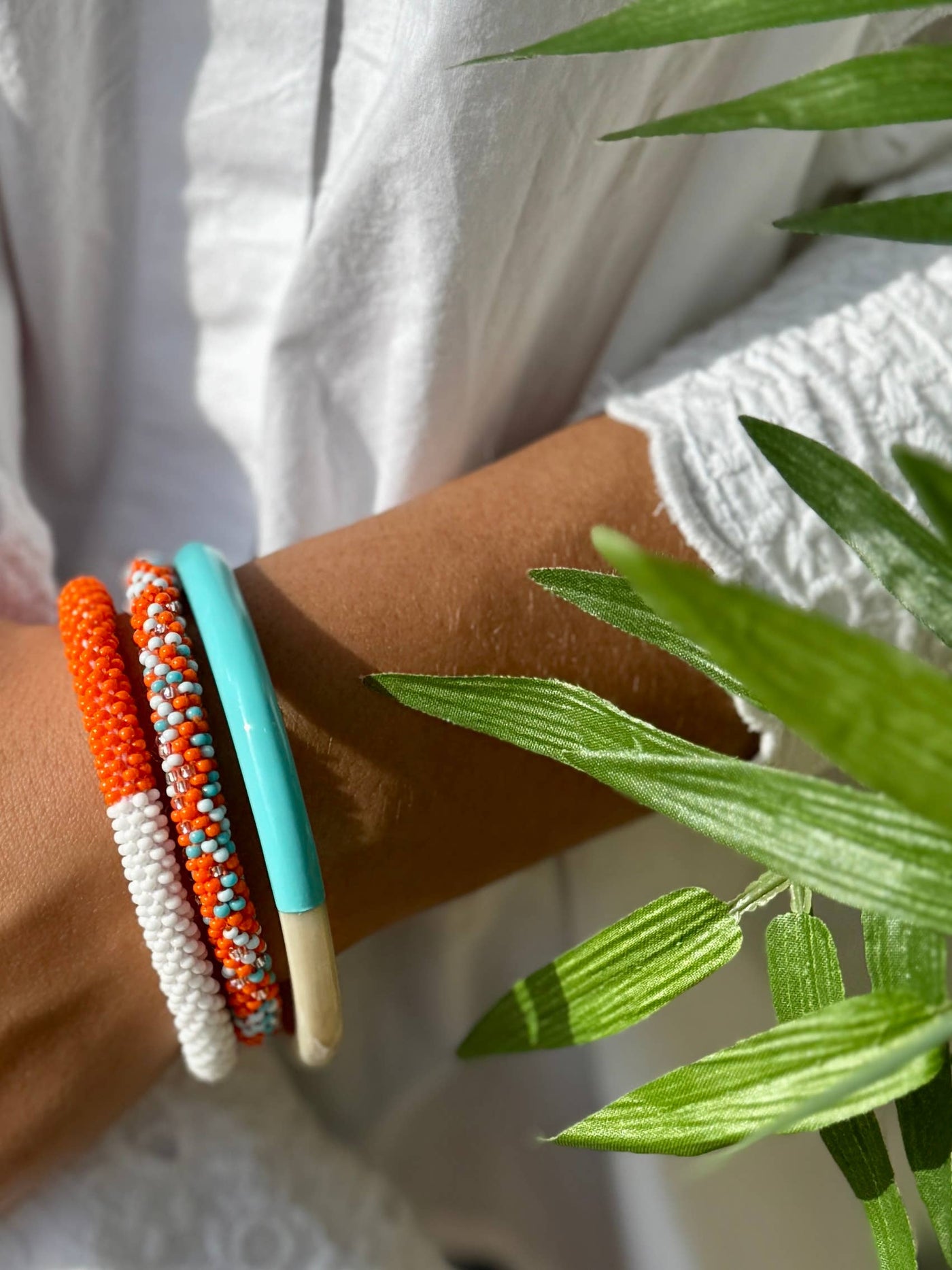 Pulsera nepalí bicolor blanco naranja