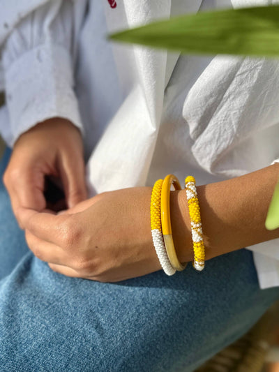 Pulsera nepalí bicolor blanco amarillo