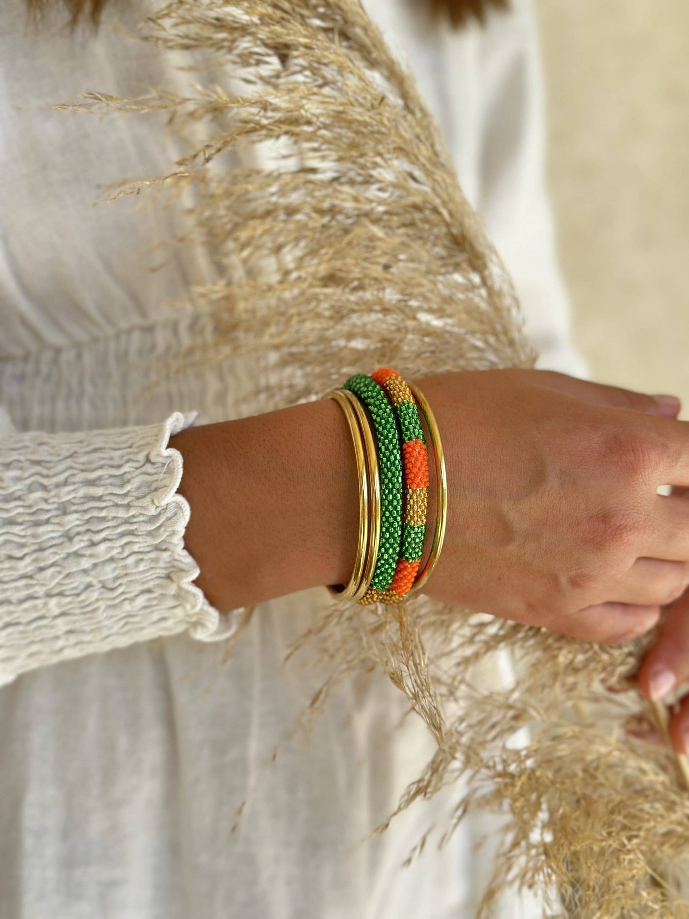 Pulsera nepalí rayas verde-naranja-oro