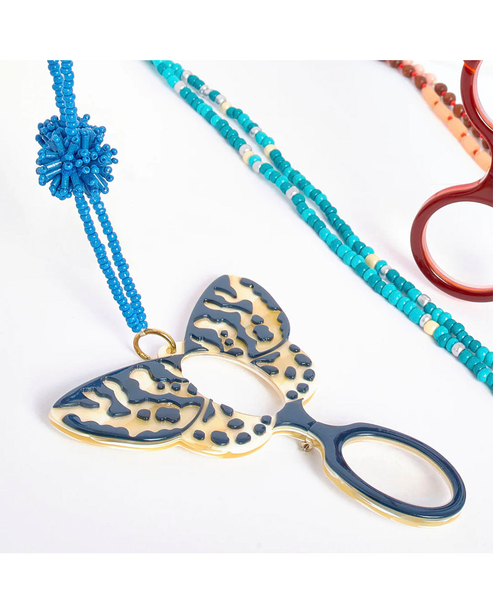 Colgante gafa mariposa Van der Ast Flippan Look
