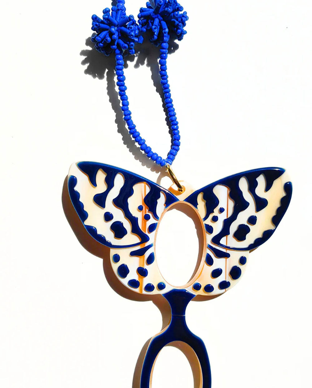 Colgante gafa mariposa Van der Ast Flippan Look