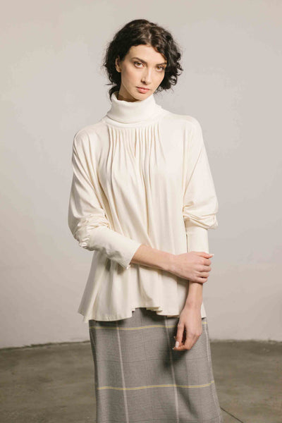 Blusa cuello vuelto blanca PAN Producto Básico