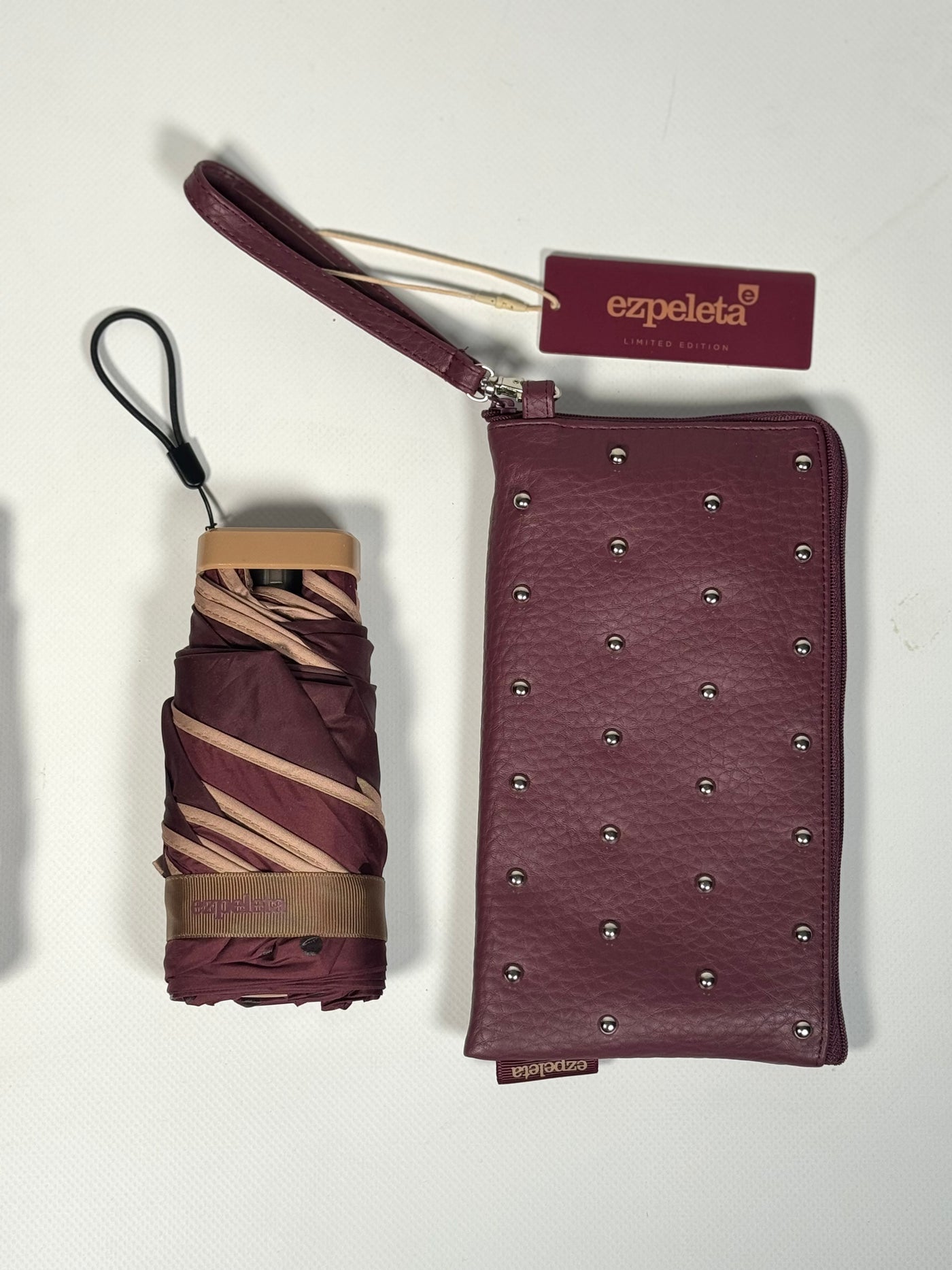 Paraguas tachuelas manual burdeos lunares Ezpeleta