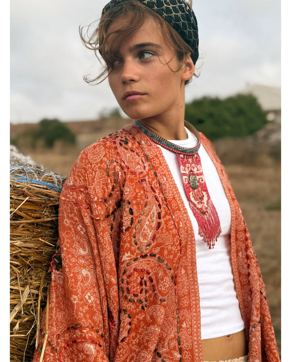 Poncho lana bordado naranja Poc a Poc