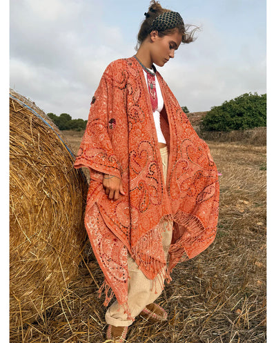 Poncho lana bordado naranja Poc a Poc