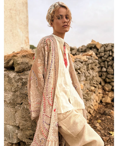 Poncho lana bordado beige Poc a Poc