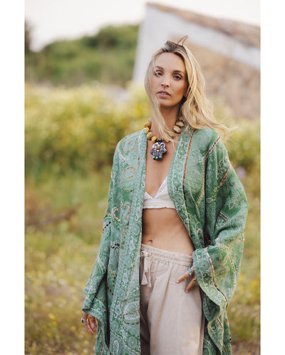 Poncho lana bordado verde te Poc a Poc