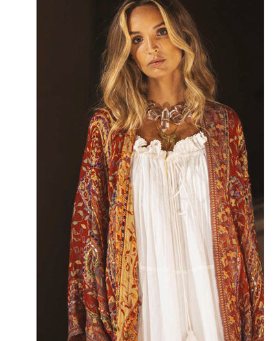 Poncho lana bordado rojo Poc a Poc