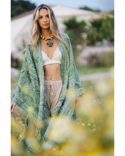 Poncho lana bordado verde te Poc a Poc
