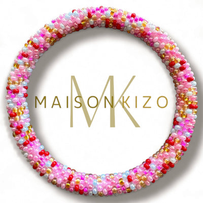 Pulsera nepalí multicolor rosa-rojo-blanco