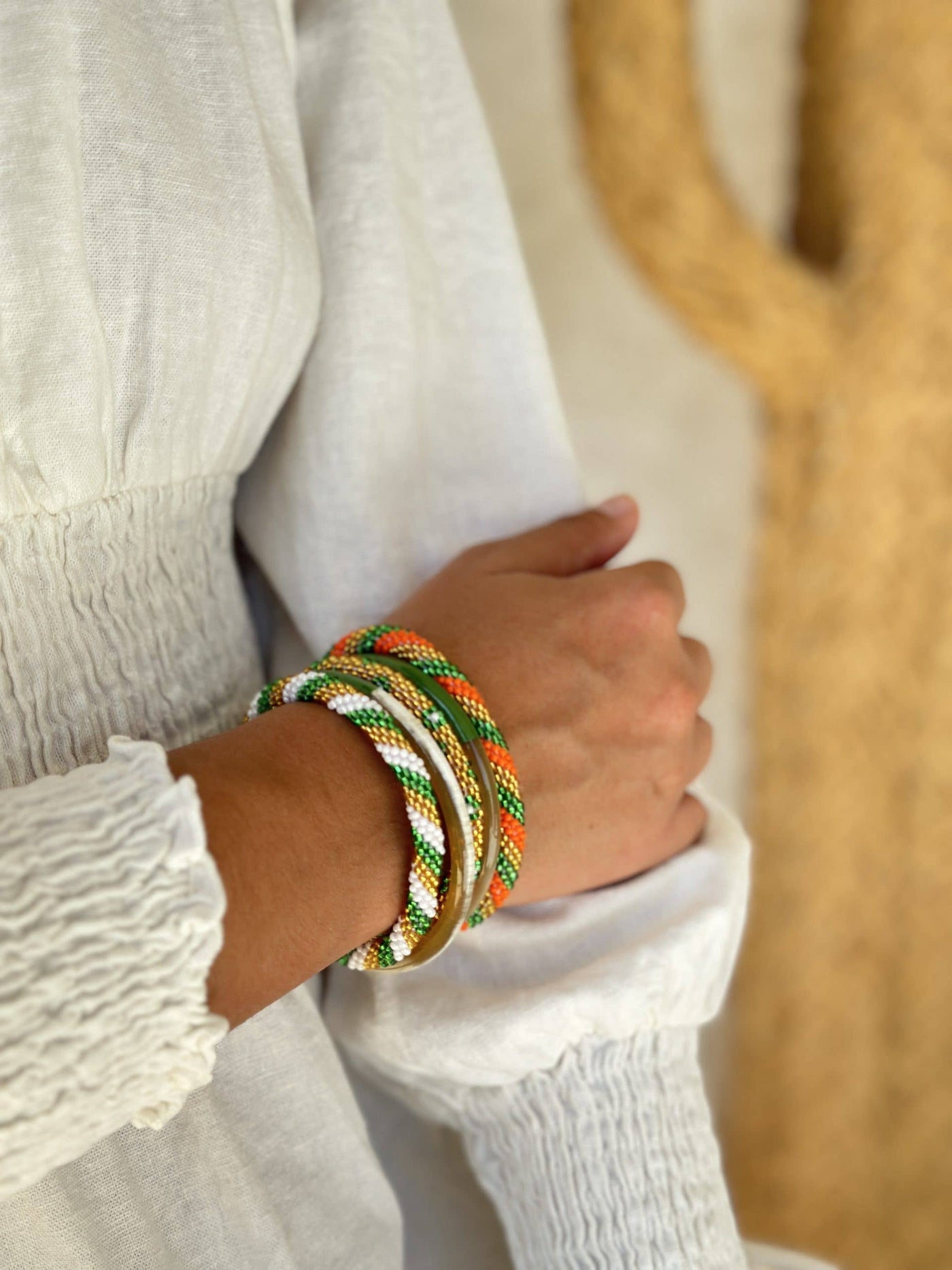 Pulsera nepalí cordones verde-naranja-oro