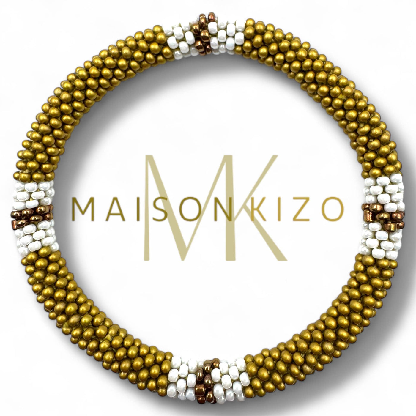 Pulsera nepalí oro mate raya blanca B09