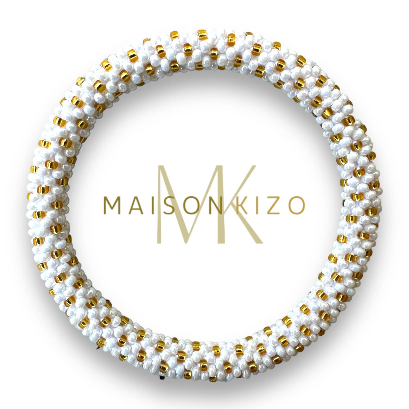 Pulsera nepalí blanca topos dorados